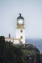 Misty Neist Point Lighthouse at Isle of Skye, Scotland Royalty Free Stock Photo