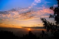 Misty orange sunrise over the mountains Royalty Free Stock Photo