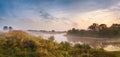 Misty river in the morning. Panorama. Warm summer morning