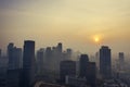 Misty skyscrapers and residential at dawning