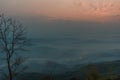 Misty summer mountain hills landscape