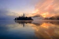 Misty sunrise on the lake Bled in autumn Royalty Free Stock Photo