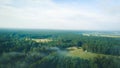 Misty sunrise over countryside path Aerial view Latvia Royalty Free Stock Photo