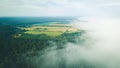 Misty sunrise over countryside path Aerial view Latvia Royalty Free Stock Photo
