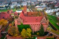 Misty sunrise over the Malbork castle and Nogat river in Poland Royalty Free Stock Photo