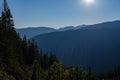 misty sunrise in Slovakian Tatra mountains with light lanes in f