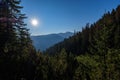 misty sunrise in Slovakian Tatra mountains with light lanes in f