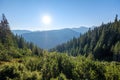 misty sunrise in Slovakian Tatra mountains with light lanes in f