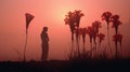 Misty Sunrise: A Yogi\'s Silhouette Amidst Red Flowers