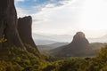 Misty at sunset of hot day on Moni Agias Varvaras Roussanou on top of rock Meteora, Greece.