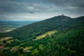 Misty sunset over the Chojnik Castle in Giant Mountains. Poland Royalty Free Stock Photo