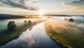 misty valley with river