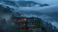 The misty valleys and peaks offer a serene and aweinspiring setting for the elevated lodge where guests can disconnect