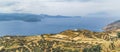 View from above of farmland and ocean Milos Greece.