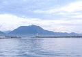 Misty view from the sea to the lighthouse and mountains in the bay of Alanya Turkey Royalty Free Stock Photo