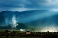 Misty village with mountain