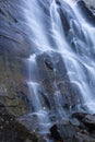 Misty water cascading over rocks