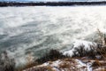 Misty water vapor rises from the water in the river in November