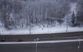 Misty winter landscape, road, snowy forest. View from above.selective focus Royalty Free Stock Photo