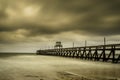 Misty Wooden Dock in Luc sur Mer, France Royalty Free Stock Photo