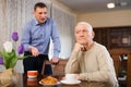 Misunderstanding between senior father and son Royalty Free Stock Photo