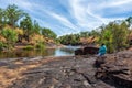 Mitchell Plateau WA Australia - May31 2015: An indigenous Australian woman from the local Kandiwal community sits beside a Royalty Free Stock Photo