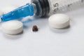 Mite, tablets and syringe Royalty Free Stock Photo