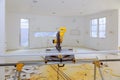 Miter Saw on a construction site with in contractor uses a circular saw to cut and trim Royalty Free Stock Photo