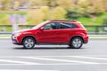 Mitsubishi asx SUV vehicle on the city road. Fast moving red car on Moscow streets. Accelerating with low-emission. Compliance Royalty Free Stock Photo