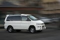 Mitsubishi Delica white minibus.