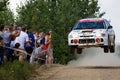 Mitsubishi Lancer jumping in rally Royalty Free Stock Photo