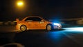 Mitsubishi Lancer sports car racing at Chayka circuit, Kyiv, Ukraine, night race, 09.04.2016, editorial photo