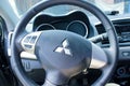 Mitsubishi machine inside the cabin. close-up of the steering wheel with airbag