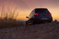 Mitsubishi outlander turbo in mountain road during sunset Royalty Free Stock Photo