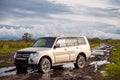 Mitsubishi Pajero/Montero at dirt road after rain