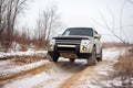 Mitsubishi Pajero/Montero at dirt road in winter