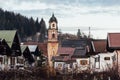 MITTENWALD, GERMANY - DECEMBER 2018: roofs of old town with church of St. Peter and St. Paul tower in the center