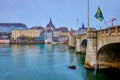 Mittlere Brucke bridge and Basel-Stadt Old Town district on background, on April 1 in Basel, Switzerland