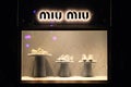 Miu miu`s logo and footwear window display