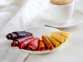 Mix assorted colorful homemade fruit berry paste on ceramic plate and cup coffee Royalty Free Stock Photo