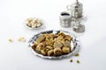 Mix baklava dish or baklawa is arabic and turkish traditional sweets with pistachio , top view