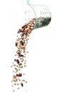 Mix beans fall down explosion, several kind bean float pouring in measured cup. Dried white green red soy black peanut mixed beans
