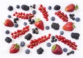 Mix berries and fruits on white background. Ripe blueberries, blackberries, strawberries, red currants and blackcurrants. Top view Royalty Free Stock Photo