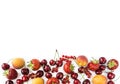 Mix berries isolated on a white. Ripe apricots, red currants, cherries and strawberries. Berries and fruits with copy space for te