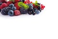 Mix berries isolated on a white. Ripe blueberries, blackberries, red currants, black currant, raspberries and strawberries. Royalty Free Stock Photo