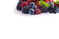 Mix berries isolated on a white. Ripe blueberries, blackberries, red currants, black currant, raspberries and strawberries. Royalty Free Stock Photo