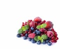 Mix berries isolated on a white. Ripe blueberries, red currants, raspberries and strawberries. Various fresh summer berries on whi Royalty Free Stock Photo