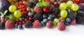 Mix berries on a white background. Ripe red currants, grapes, blackberries, blueberries and raspberries on white background. Top v Royalty Free Stock Photo