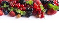 Mix berries on a white background. Ripe red currants, strawberries, blackberries, blueberries, blackcurrants, gooseberries Royalty Free Stock Photo