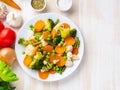 Mix of boiled vegetables, steam vegetables for dietary low-calorie diet. Broccoli, carrots, cauliflower, top view, copy space Royalty Free Stock Photo